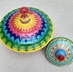 Kleine en grote bromtol in metaal. Brocante, Ophalen