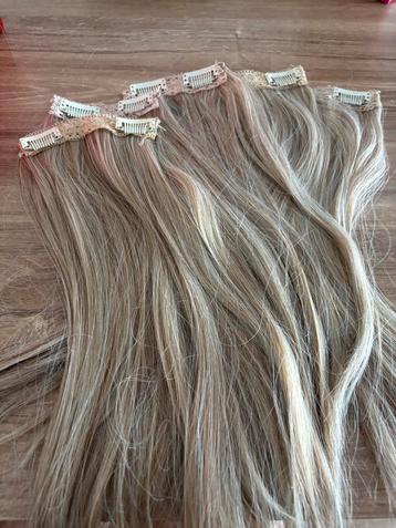 Clip in extensions beschikbaar voor biedingen