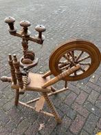 Houten spinnewiel, Ophalen