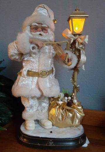 Kerstman met viool, licht en geluid. beschikbaar voor biedingen