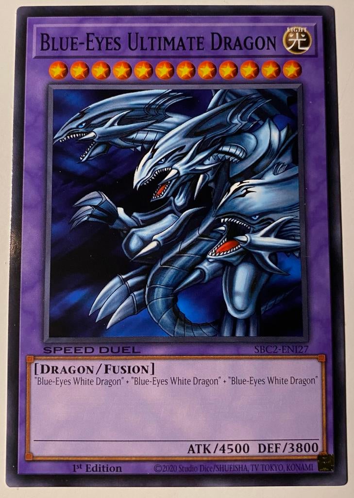 Yu-Gi-Oh! Blue-Eyes Ultimate Dragon SBC2 1st Edition !, Hobby en Vrije tijd, Verzamelkaartspellen | Yu-gi-Oh!, Ophalen of Verzenden