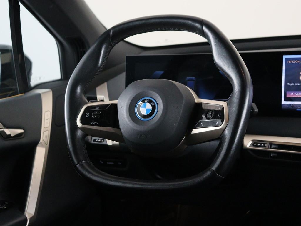 BMW iX xDrive40 Business Edition Plus 77 kWh (bj 2023), Auto's, BMW, Gebruikt, Met garantie (alle), 24 min, Vierwielaandrijving