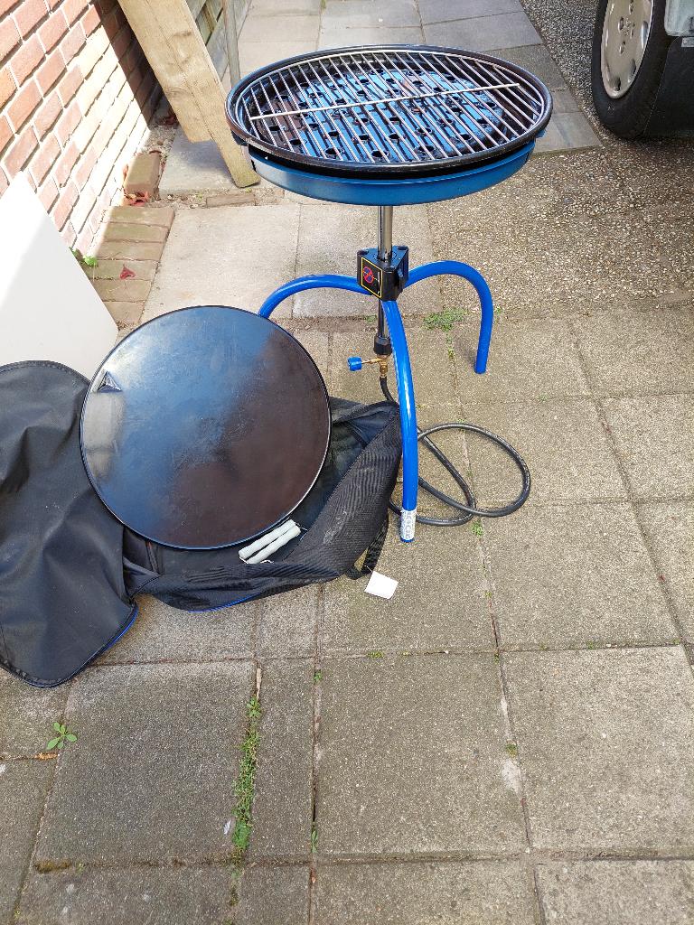 Skottelbraai met ook grillrooster, Ophalen