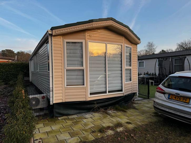 Stacaravan 12x3.8m met 2 slaapkamers op Camping Posthoorn, Caravans en Kamperen, Stacaravans, tot en met 4, Ophalen