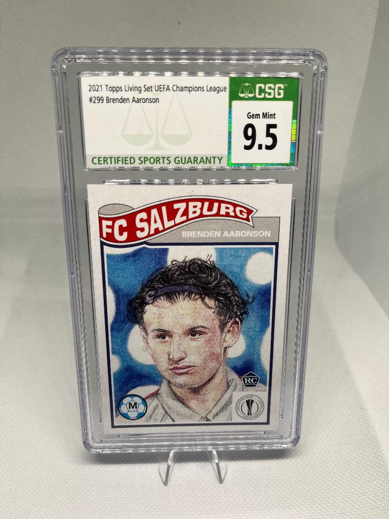CSG 9.5 Brenden Aaronson 2021 Topps Living Set RC #299, Ophalen of Verzenden, Nieuw, Buitenlandse clubs, Spelerskaart