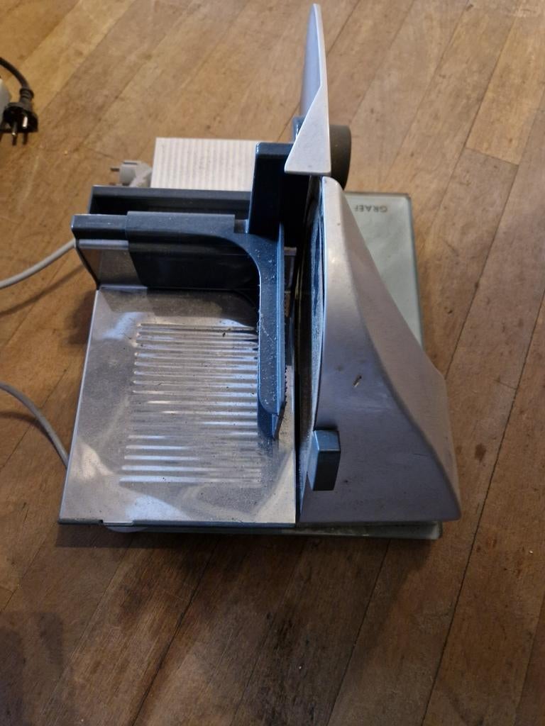 Graef vleessnijmachine, Ophalen