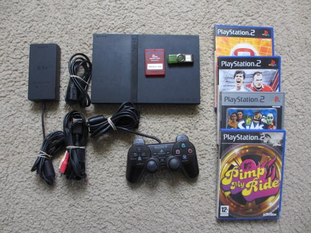 Playstation 2 slim met 1100 games, Gebruikt, Zwart, Met games, Ophalen of Verzenden