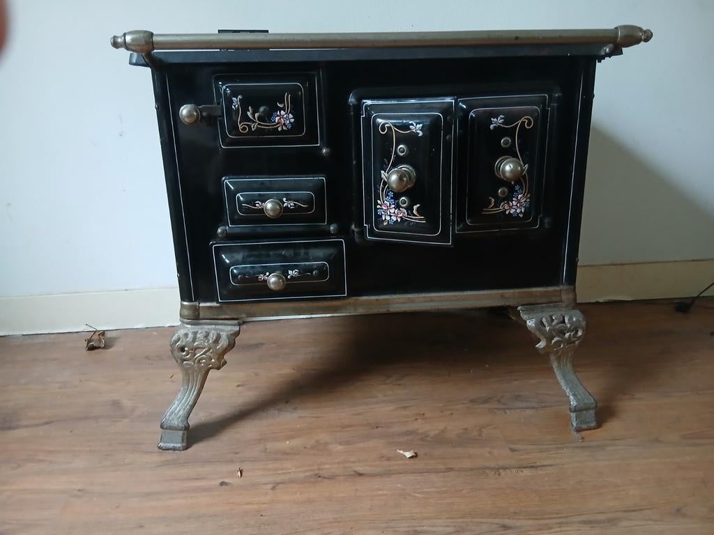 Antieke houtstoof ,zwart met beschildering zeer goeie staat, Antiek en Kunst, Ophalen of Verzenden