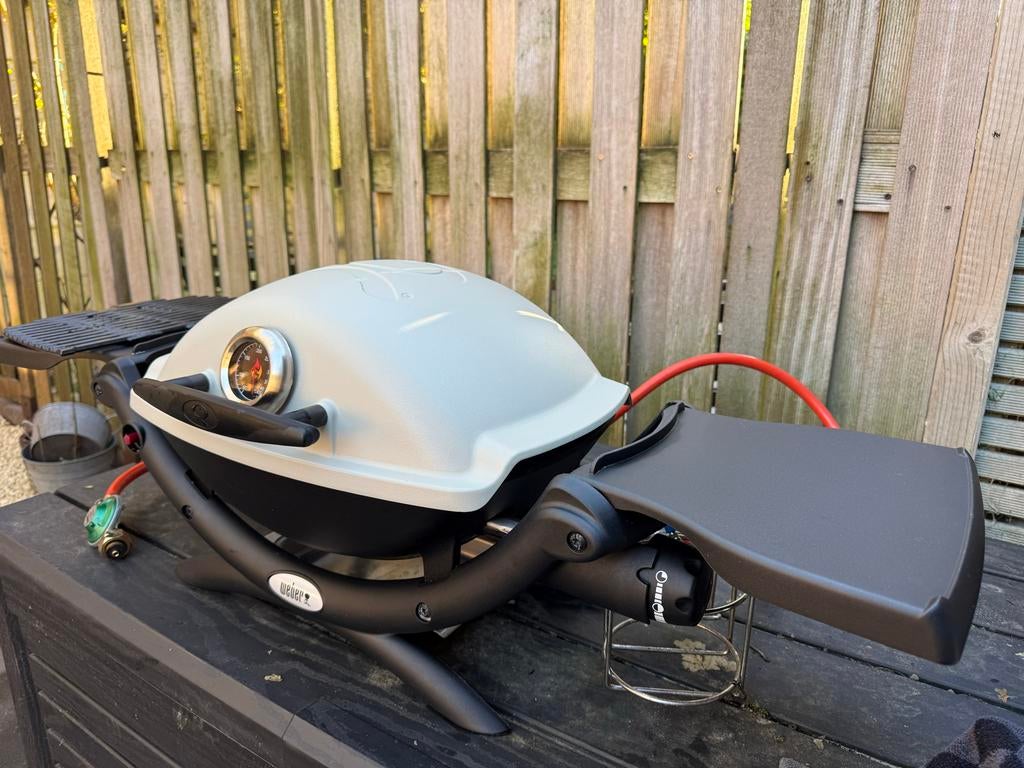 Weber Q1000 BBQ - Gasbarbecue met bakplaat en tafeltjes, Ophalen, Gebruikt