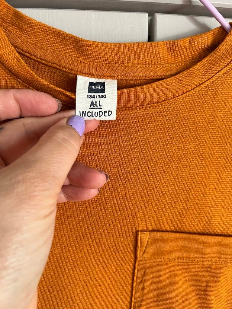Oranje t shirtje van de Hema, maat 134/140, Kinderen en Baby's, Kinderkleding | Maat 134, Ophalen, Zo goed als nieuw