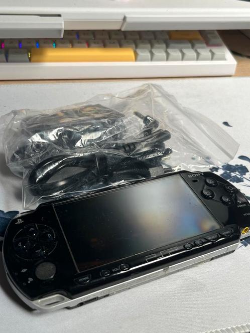 PSP Sony 2004 Black, Spelcomputers en Games, Games | Overige, Zo goed als nieuw, 1 speler, Ophalen of Verzenden