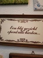 Wanddecoratie: Een blij gezicht opent alle harten, Ophalen of Verzenden, Gebruikt