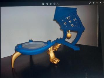 Tafelklok plus asbak Salvador Dali stijl beschikbaar voor biedingen