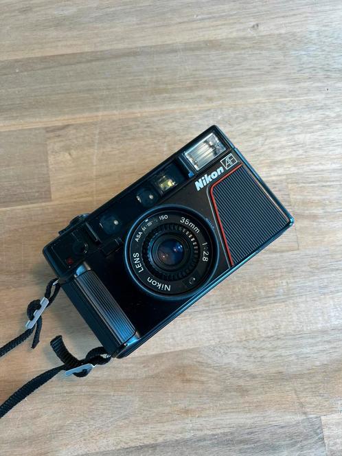 Nikon L35AF analoge film camera (sluiter zit vast), Audio, Tv en Foto, Fotocamera's Analoog, Niet werkend, Compact, Nikon, Ophalen of Verzenden