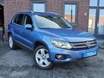 Volkswagen Tiguan 2.0 TSI Track& Style 4Motion / Offroad uit, Auto's, Gebruikt, Blauw, Leder, Bedrijf