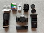 Canon AE-1 met extra lenzen, flitser en batterij, Audio, Tv en Foto, Fotocamera's Analoog, Ophalen of Verzenden, Gebruikt, Spiegelreflex