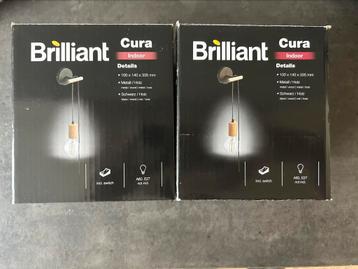 Brilliant Cura wandlampen 2 stuks nieuw in doos beschikbaar voor biedingen