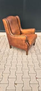 Schapenleren fauteuil, Ophalen
