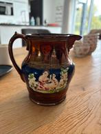 Antieke kan met decoratie, Ophalen