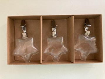 Drie doosjes met ieder drie glazen kerststerren beschikbaar voor biedingen