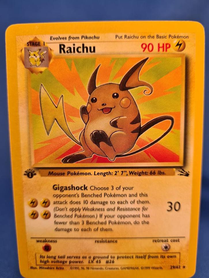 Raichu 29/62 - Fossil (1st edition), Hobby en Vrije tijd, Verzamelkaartspellen | Pokémon, Gebruikt, Verzenden