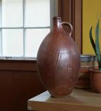 Antieke terracotta kruik, Ophalen