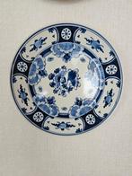 Delfts blauw bord, Ophalen