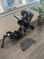 Doona Autostoel/Kinderwagen + Isofix + Beschermer, Zijbescherming, Zo goed als nieuw, Isofix, 0 t/m 13 kg