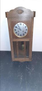 Antieke regulateur klok, Ophalen