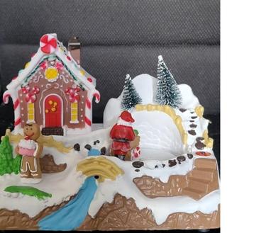 kerstdorp peperkoeken huis met draaiende kerstman beschikbaar voor biedingen