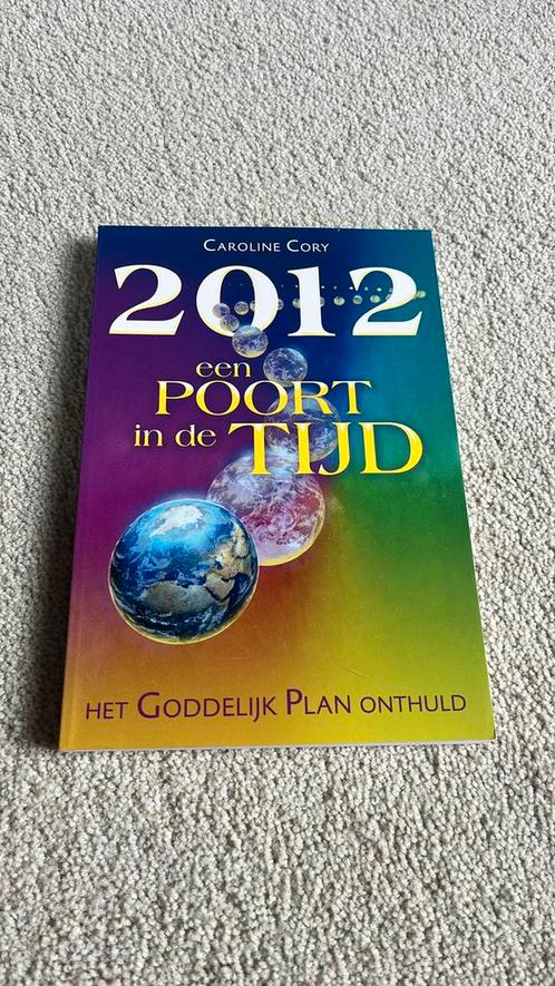 Caroline Cory - 2012 een poort in de tijd, Boeken, Esoterie en Spiritualiteit, Zo goed als nieuw, Achtergrond en Informatie, Spiritualiteit algemeen