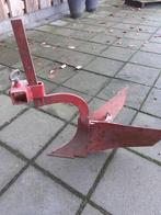 Aan aardploeg voor tweewielige tractor, Ophalen