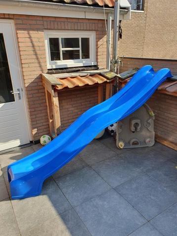 Losse lange blauwe glijbaan beschikbaar voor biedingen