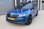 Skoda Karoq 1.5 TSI Sportline Pano ACC El.koffer Canton 18", Stof, 4 cilinders, Blauw, Karoq