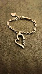 Guess Armband – Elegant en Goudkleurig met Hartbedel., Ophalen of Verzenden