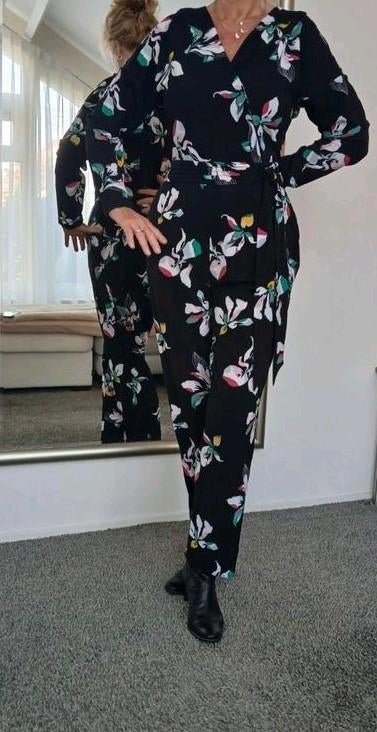 Zwarte jumpsuit maat 42 eventueel met jasje van Steps, Kleding | Dames, Zwart, Maat 42/44 (L), Ophalen of Verzenden, Zo goed als nieuw