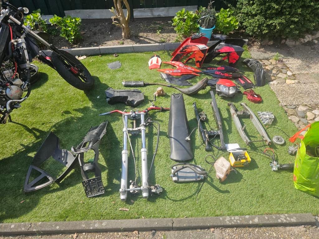 Aprilia sx met wok in onderdelen, Eén persoon, Kortingskaart