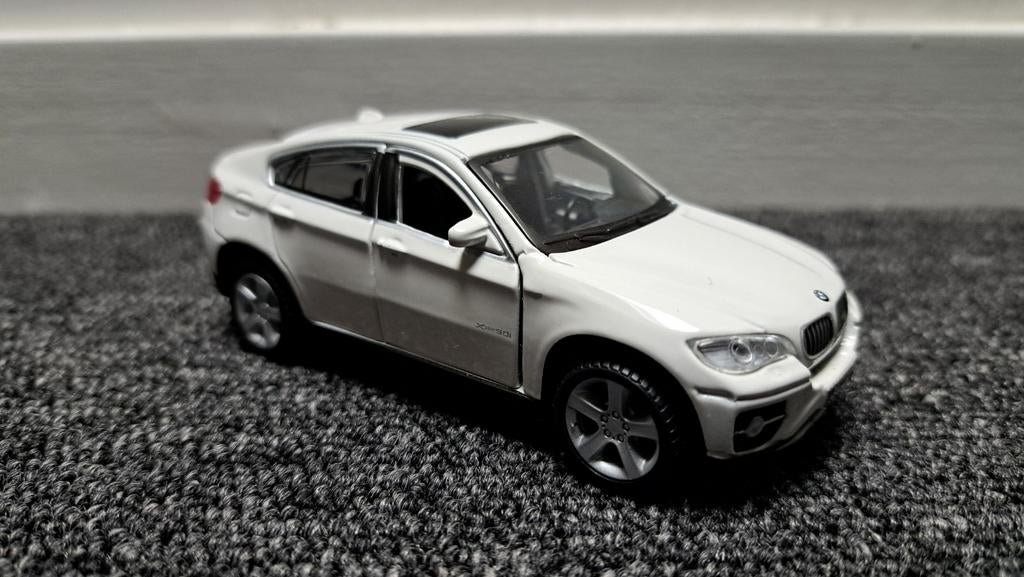 BMW X6 (1:41) NIEUWSTAAT!, Hobby en Vrije tijd, Modelauto's | 1:43, Ophalen of Verzenden, Zo goed als nieuw, Auto, Overige merken