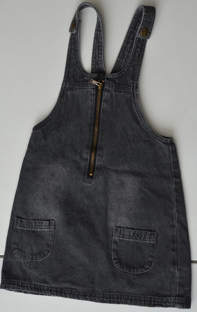 zwarte  jeans overgooier maat 122/128 met stoere rits, Ophalen of Verzenden, Zo goed als nieuw, Meisje, Jurk of Rok