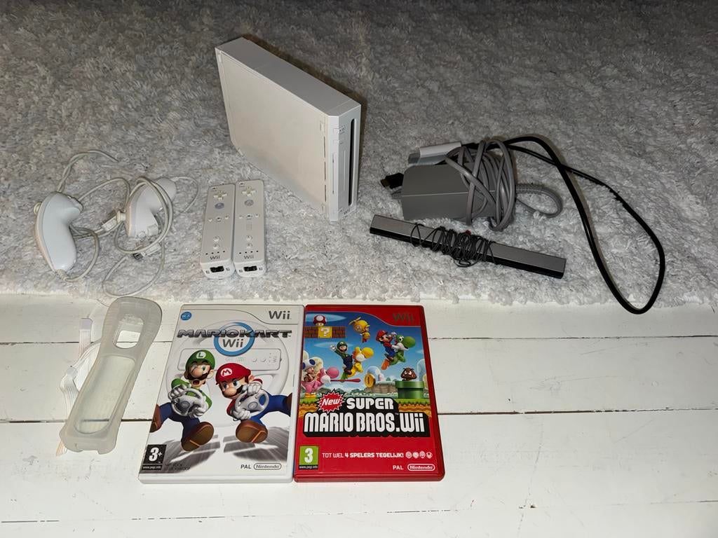 Nintendo Wii Bundel met 2 controllers, HDMI-adapter en games, Ophalen of Verzenden, Gebruikt, Met 2 controllers, Met games