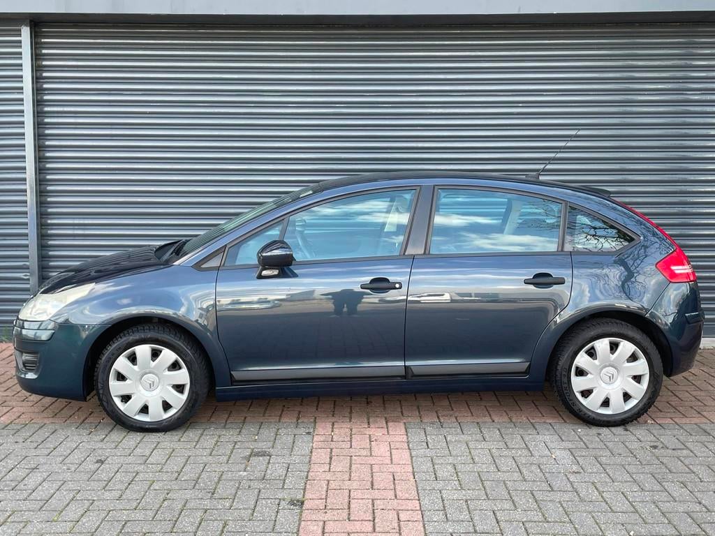 Citroen C4 1.4 16V Anniversaire Airco | Cruise | Pdc | Clima, Auto's, Voorwielaandrijving, Stof, 4 cilinders, Blauw