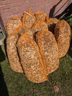 Mooie houtsnippers in zak, Ophalen