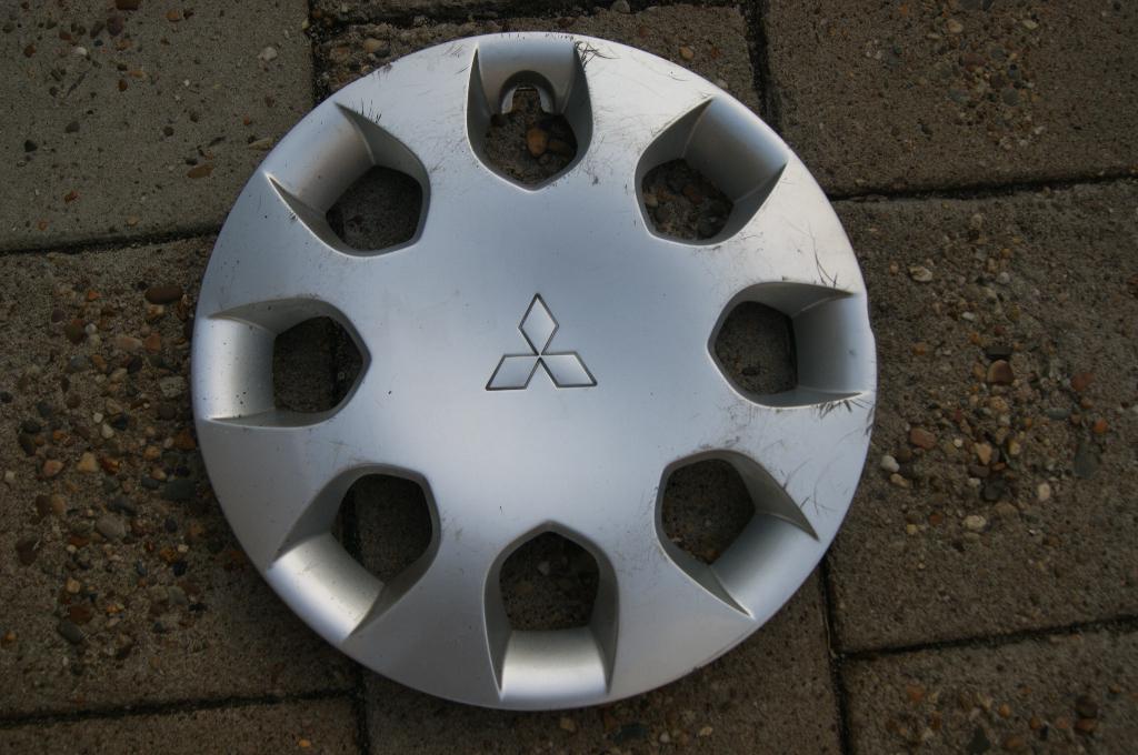 1 losse originele wieldop Mitsubishi Golt 15 inch, Ophalen of Verzenden, Gebruikt