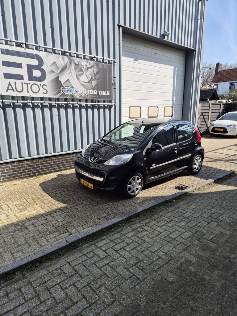 Peugeot 107 5-DRS 2011 Airco en Electrische ramen, Auto's, Citroën, Voorwielaandrijving, Stof, 4 stoelen, C1