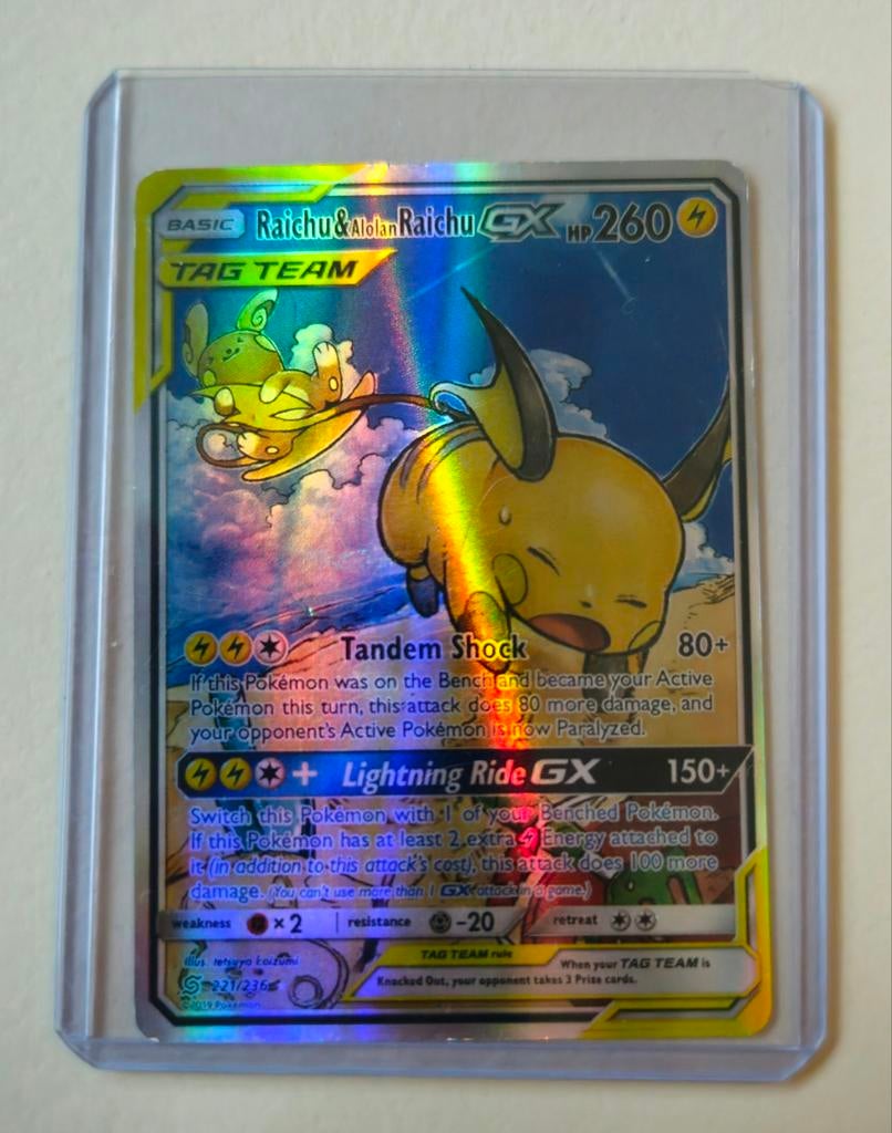 Raichu & Alolan Raichu GX 221/236 - Zeldzame kaart!, Hobby en Vrije tijd, Verzamelkaartspellen | Pokémon, Ophalen of Verzenden
