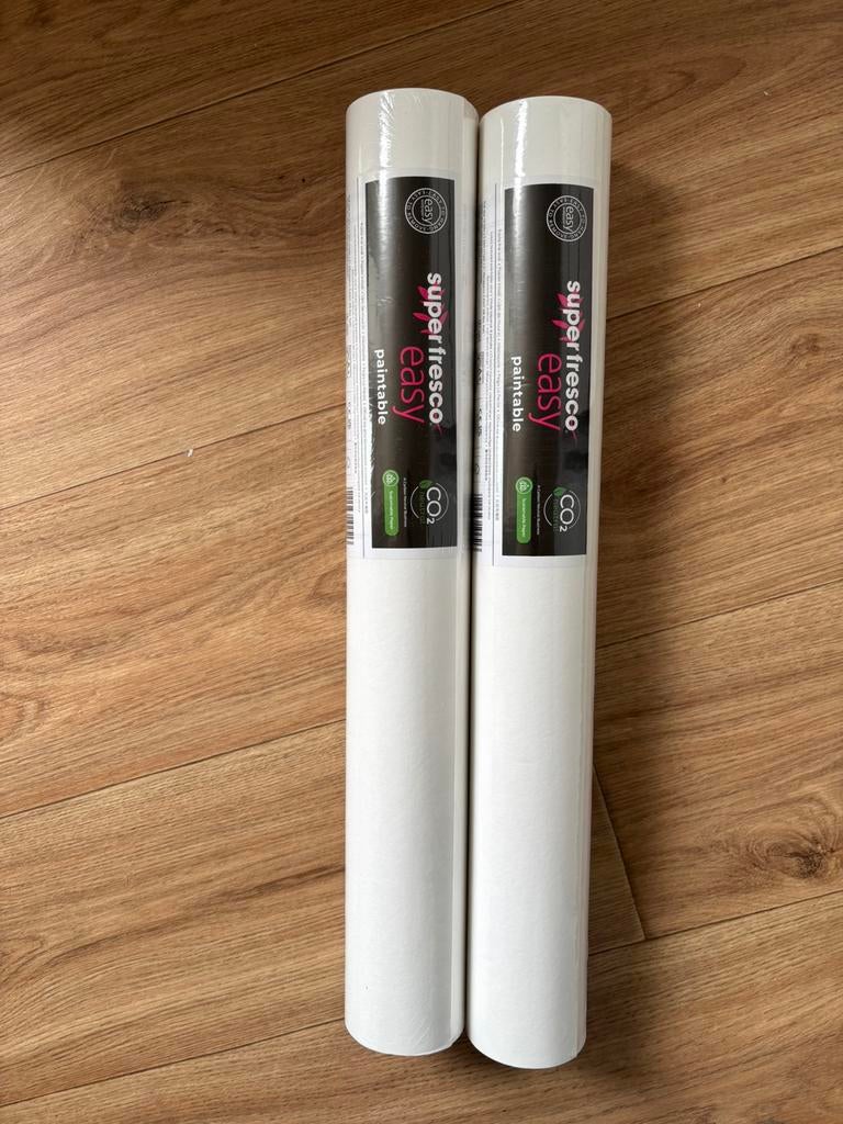 2 rollen vliesbehang, Ophalen