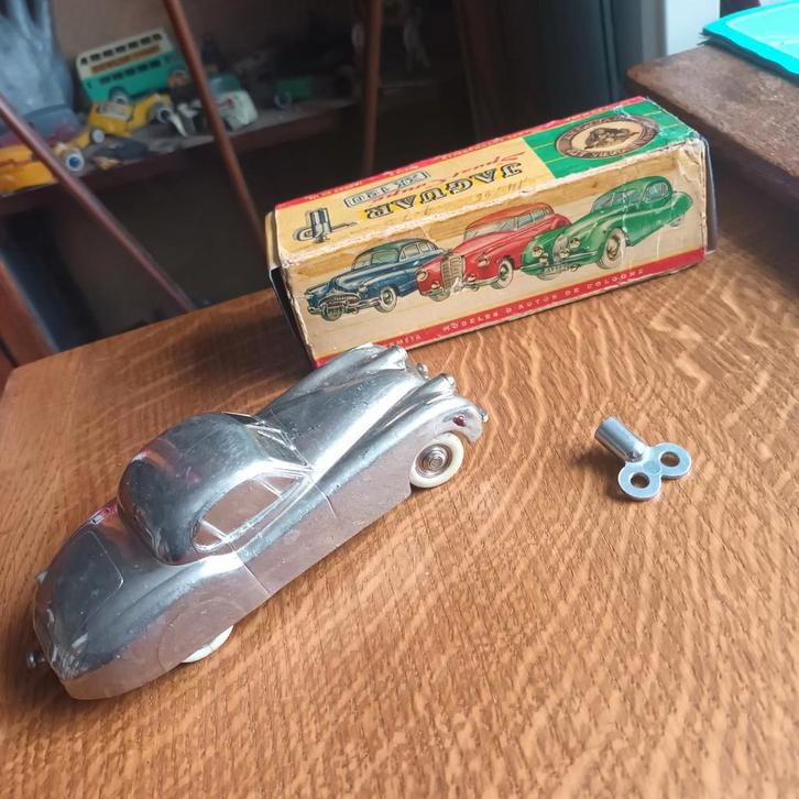 prameta JAGUAR XK 120 werkend mechanisme doos+kopie endflaps, Antiek en Kunst, Antiek | Speelgoed, Verzenden