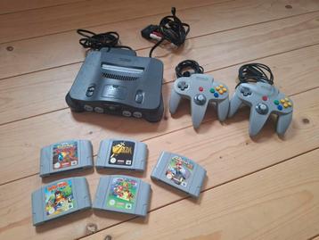 Nintendo 64 + twee controllers + vijf spellen beschikbaar voor biedingen