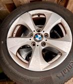 *Vier banden met velgen BMW*, Ophalen, BMW