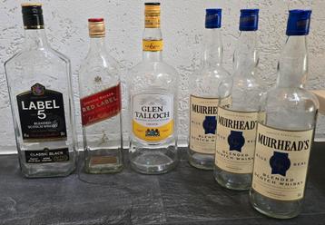 Lege whiskey flessen 6 stuks. Let op ze zijn leeg beschikbaar voor biedingen